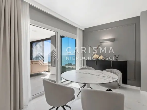 (14) Apartament w pierwszej linii brzegowej w Punta Prima z panoramicznym widokiem na Morze Śródziemne