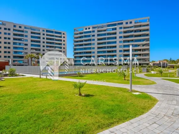 (51) Apartament w pierwszej linii brzegowej w Punta Prima z panoramicznym widokiem na Morze Śródziemne